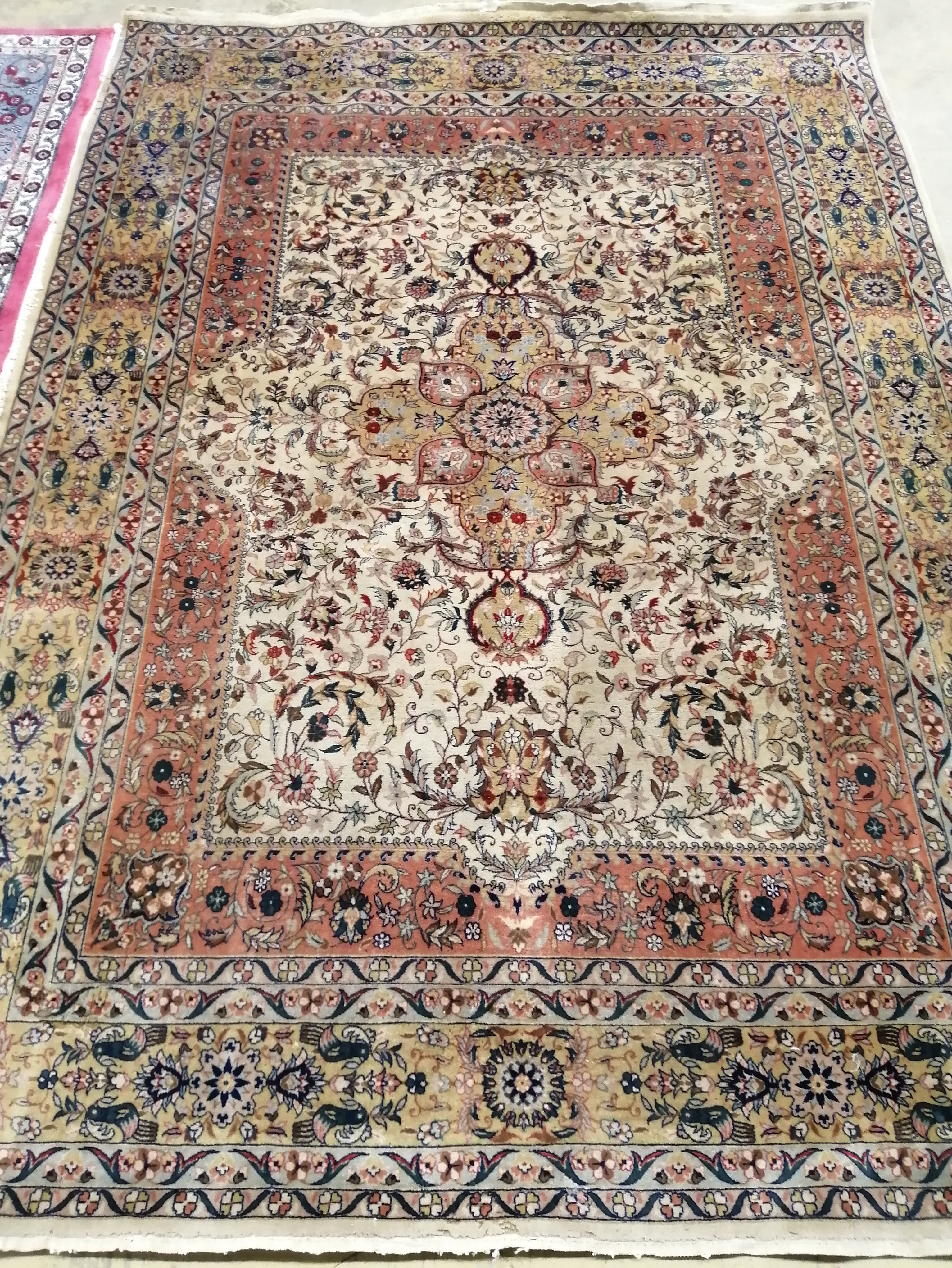 A fine Mohtasham design ivory ground rug, 242 x 175cm